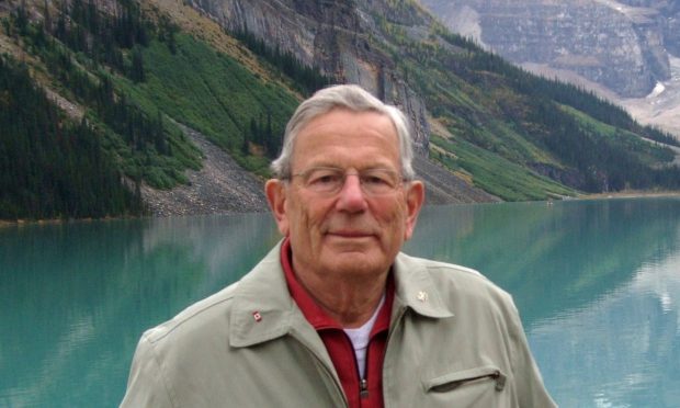 Peter Tong loved travelled and is pictured at Lake Louise in Canada. Pic supplied by family.