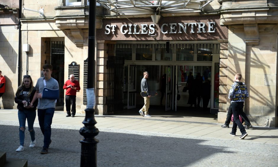 Shoppers outside St Giles Centre. 