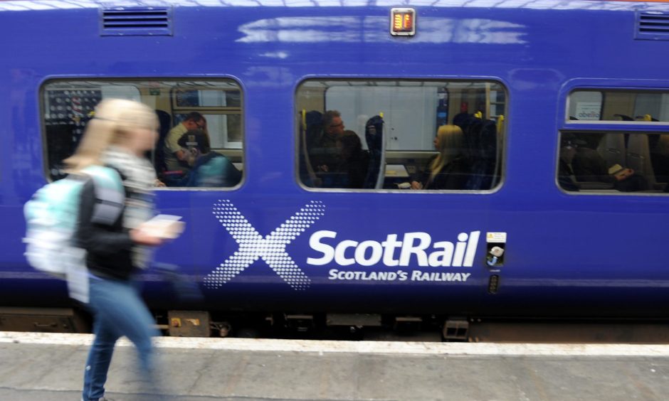 Passengers at Inverness railway station. 