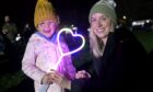 Natalie Stephen with her daughter Jessica (4) of Inverness enjoying the evening. Sandy McCook/DC Thomson