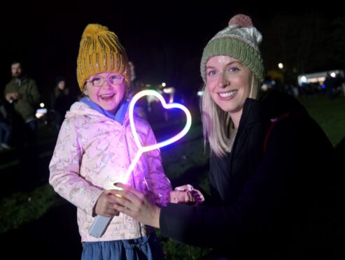 Natalie Stephen with her daughter Jessica (4) of Inverness enjoying the evening. Sandy McCook/DC Thomson