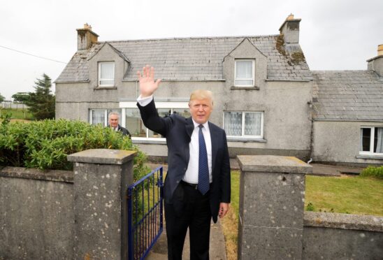 Tycoon Donald Trump at the house in Tong, on the Isle of Lewis, where Donald Trump's mother was brought up. Image: Andrew Milligan/PA Wire