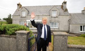 Donald Trump ourside his family home in Tong.