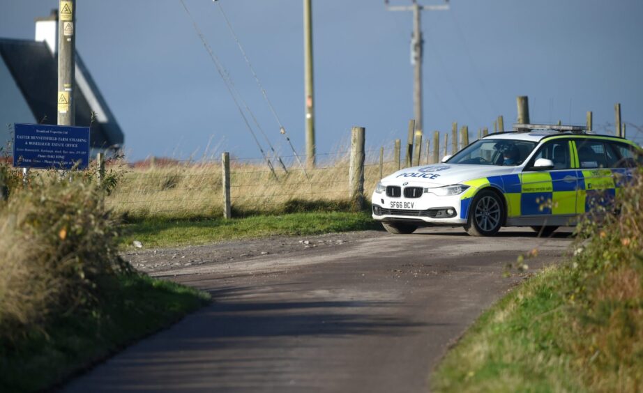 Police vehicles at Easter Bennetsfield, Avoch 