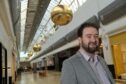 It's beginning to look a lot like Christmas  behind Eastgate Centre manager Chris Kershaw. Image: Sandy McCook/DC Thomson