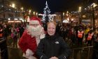 Hundreds gathered for the Christmas lights switch-on despite the weather. Image: Sandy McCook/DC Thomson