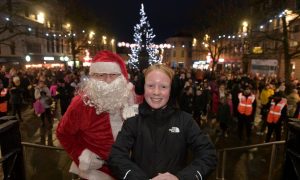 Hundreds gathered for the Christmas lights switch-on despite the weather. Image: Sandy McCook/DC Thomson