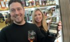 Beau Wallace with his partner Jane Manson, owners of Grand Drams on Old Edinburgh Road, Inverness with some of their extensive whisky collections. Image:
Sandy McCook/DC Thomson.