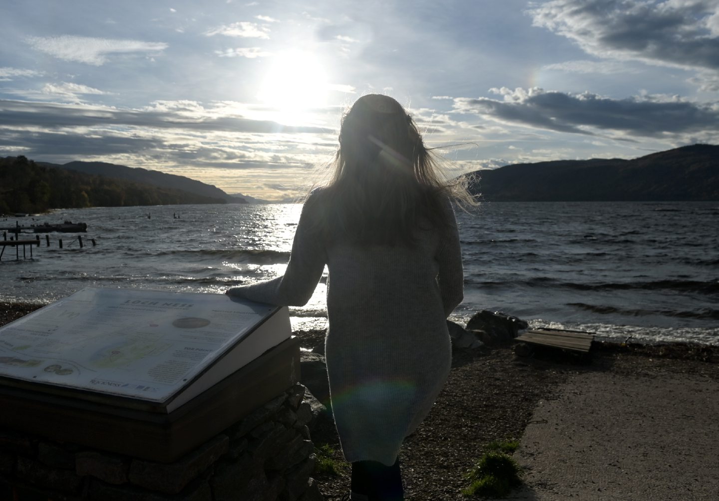 MicroMischief is a woman and she's seen in silhouette looking out across Loch Ness