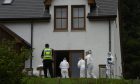 Forensics officers at the scene of an incident at a property in the Teangue area on the Isle of Skye in Scotland. Police Scotland said officers were initially called to the Tarskavaig area on Skye shortly before 9am on Wednesday after a report of a 32-year-old woman having been seriously injured at a property and who has since been taken to the Queen Elizabeth University Hospital in Glasgow for treatment. A further incident at a property in the Teangue area on Skye was then reported shortly after 9.30am after a firearm was discharged. Emergency services attended but a 47-year-old man was pronounced dead at the scene. Picture date: Thursday August 11, 2022. PA Photo. Officers subsequently attended at a property in the Dornie area in Wester Ross following a further firearm discharge at a property. The force said a man was taken to Raigmore Hospital in Inverness for treatment to serious injuries and a woman was taken to Broadford Hospital following the Dornie incident. See PA story POLICE Skye. Photo credit should read: John Linton/PA Wire