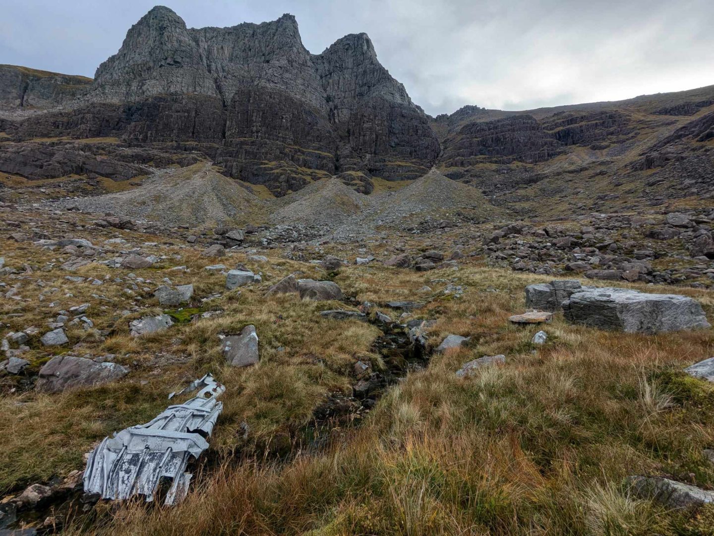 Parts of the Lancaster wreckage in Coire Mhic Fhearchair in the shadow of the iconic Triple Buttress. Image: Gayle Ritchie.