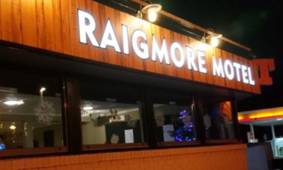 Orange glow of the outside of the Raigmore Motel.