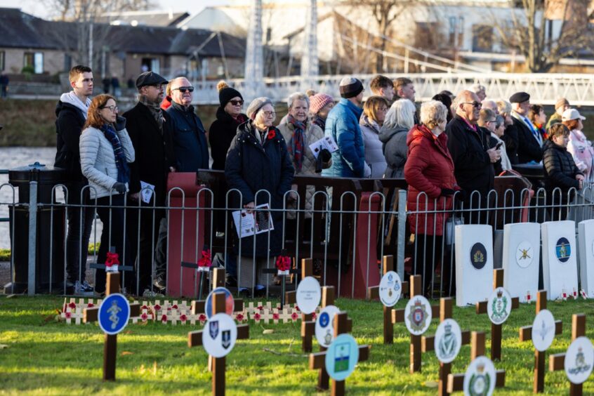 Crowd of people at Inverness Remembrance Day event