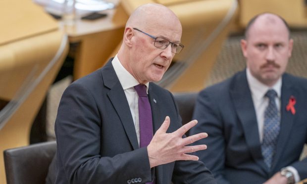 John Swinney was urged to speed up the dualling of the A9 at First Minister's Questions at Holyrood on Thursday. Image: PA.