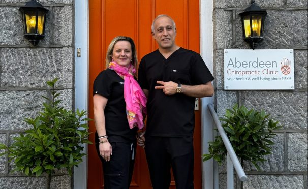 Aberdeen chiropractic Clinic new owners standing outside clinic