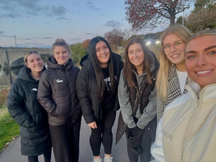 The Girls Chat walk selfie 