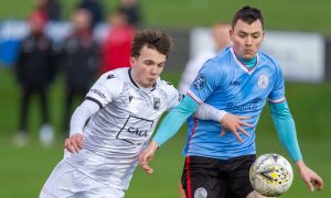 Blair Smith, left, of Inverurie Locos and Wick Academy's Ryan Campbell battle for the ball. Pictures by Jasperimage.