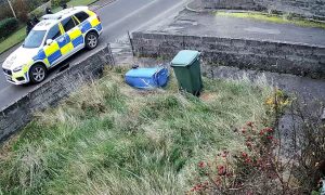 Police outside a property in Castletown. Image: Facebook.