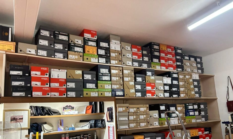 Shoeboxes are stacked sky-high throughout the store. Image: Isaac Buchan/ DC Thomson