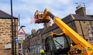 Volunteers will continue to put lights up in other parts of the town.