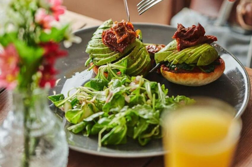 Green food on a plate.