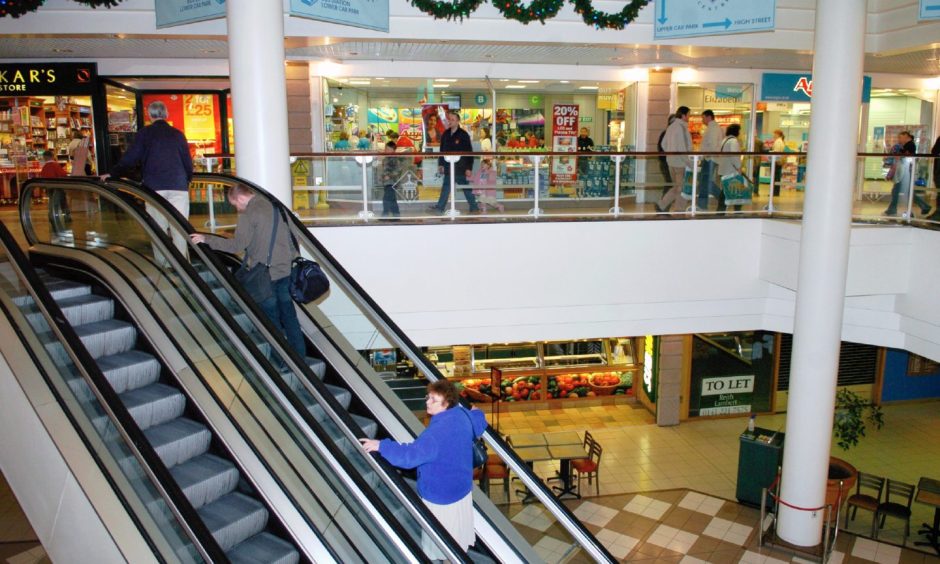 Shoppers inside St Giles Centre. 