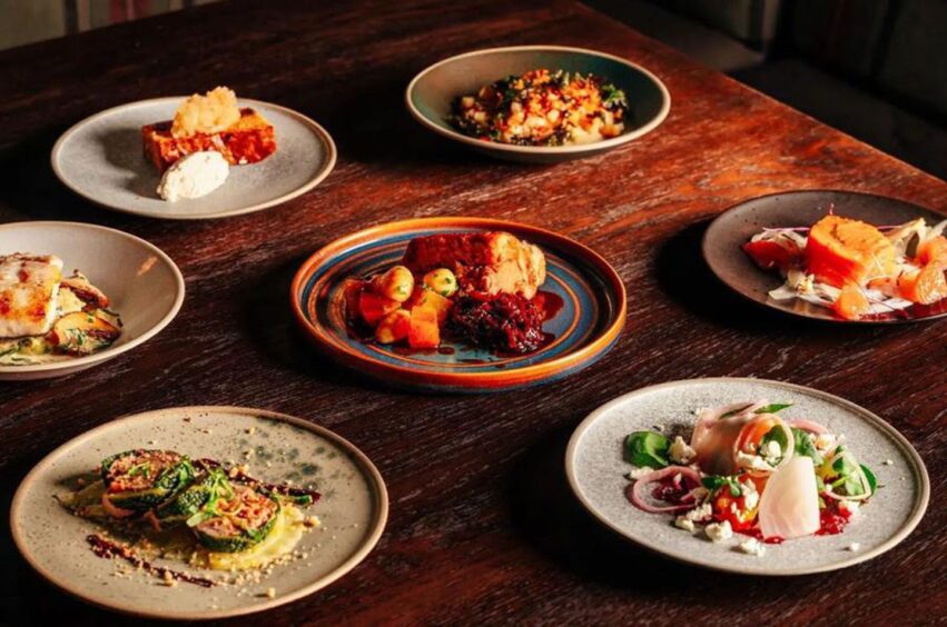 Small plates of food on a table.