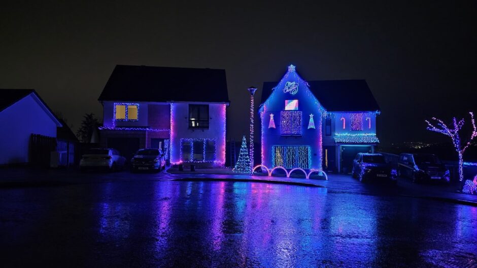 Stornoway Drive home covered in blue and pink lights.