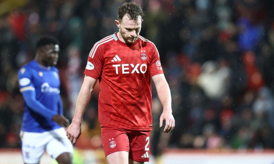 Nicky Devlin was left dejected following Aberdeen's draw with St Johnstone.