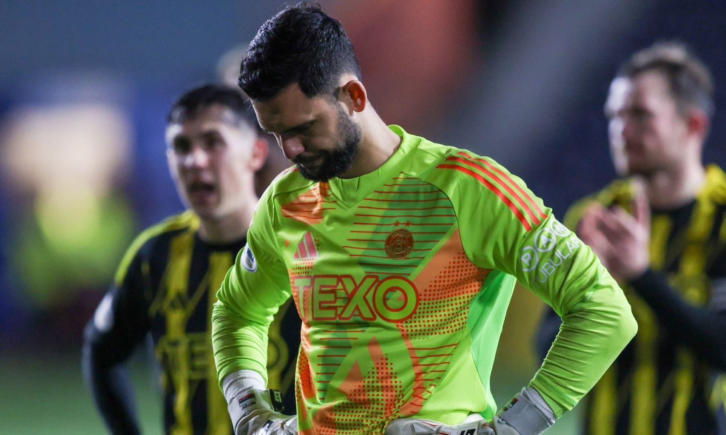 Aberdeen goalkeeper Dimitar Mitov looks dejected at the end of the 4-0 loss to Kilmarnock at Rugby Park. 