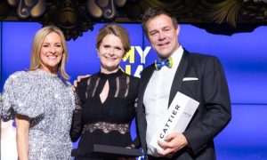 Annie Kenyon, centre, receiving the Doddie Champion Award from ex-rugby player Paul Volley and Gabby Logan. Image: Jane Craigie Marketing