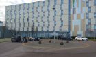 Cars outside Holiday Inn Express.