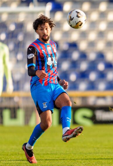 Inverness Caledonian Thistle defender Remi Savage plays the ball forward in a home SPFL League One match at the Caledonian Stadium, Inverness. 