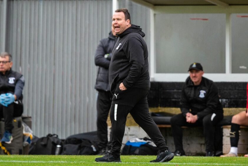 Inverness Caledonian Thistle head coach Scott Kellacher is pictured shouting instructions to his players during a League One match at Dumbarton this season. 