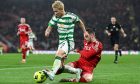 Celtic's Daizen Maeda (L) and Aberdeen's Nicky Devlin in action during the Premier Sports Cup semi-final. Image: SNS