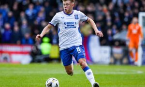 Rangers' Connor Barron dribbles with the ball at his feet against St Johnstone at Ibrox.