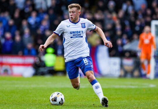 Rangers' Connor Barron dribbles with the ball at his feet against St Johnstone at Ibrox.