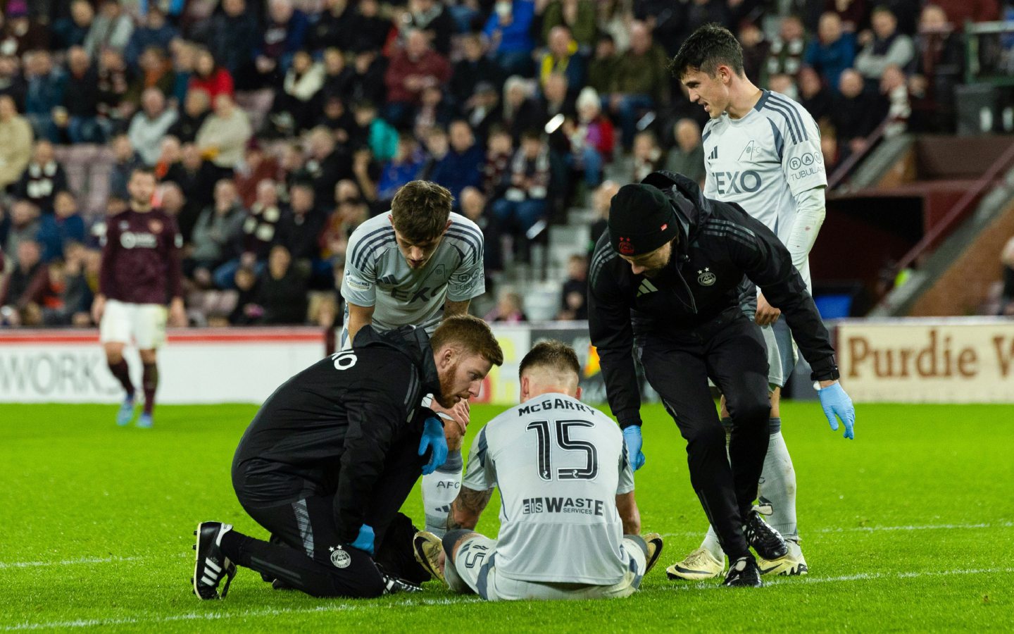 Aberdeen's James McGarry goes down with an injury during the 1-1 draw at Hearts. Image: SNS 