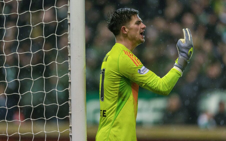 Aberdeen goalkeeper Ross Doohan lines up his defensive wall against Celtic