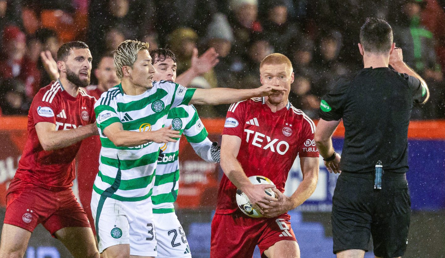 Celtic's Daizen Maeda (L) and Aberdeen's Sivert Heltne Nilsen (C) during the 1-0 loss at Pittodrie. Image: SNS 