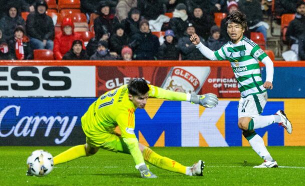 Reo Hatate scores for Celtic at Aberdeen.