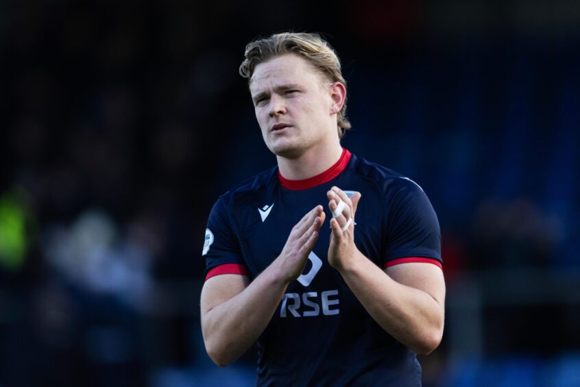 Ross County forward Alex Samuel applauds fans after Sunday's 3-0 home loss against Rangers.