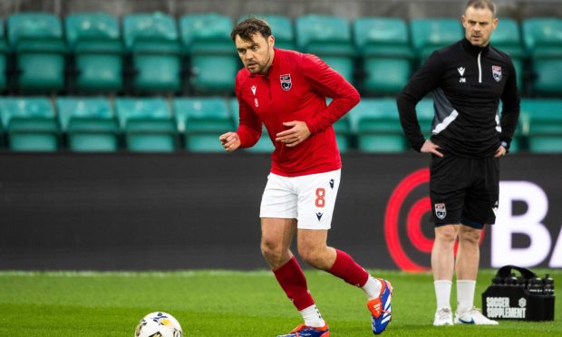 Ross County captain Connor Randall being put through his paces during a warm-up ahead of a Premiership match against Hibernian at Easter Road Stadium, Edinburgh on December 14, 2024.