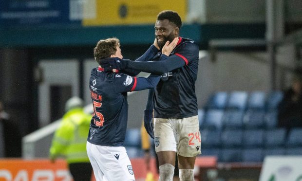 Ross County's Michee Efete (right) celebrates with Aidan Denholm after making the score 1-1.