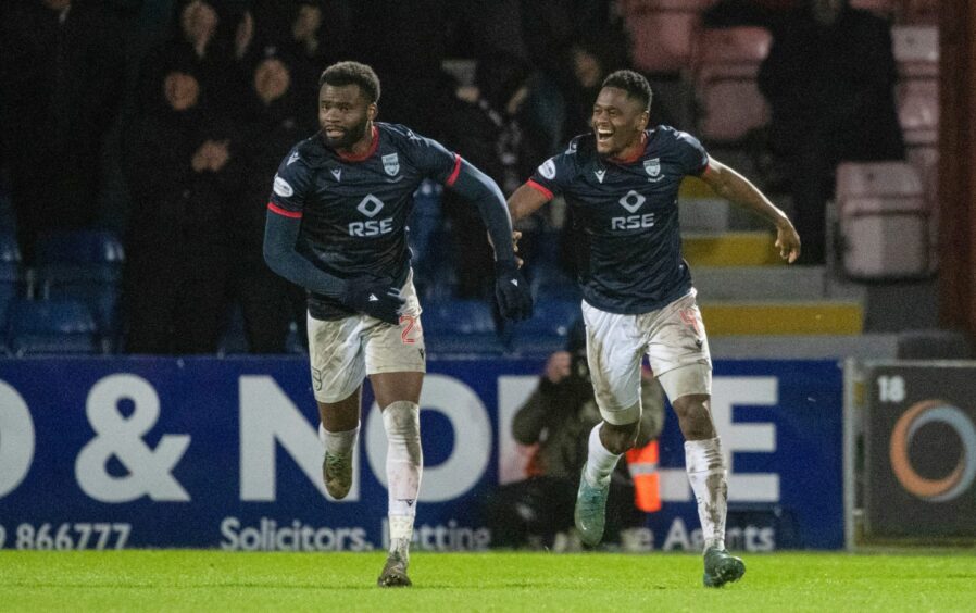 Ross County's Michee Efete (left) celebrates his equaliser with Akil Wright in Saturday's 2-1 defeat against St Mirren at the Global Energy Stadium in Dingwall.