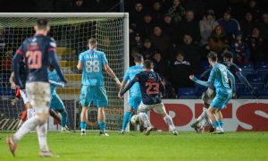 Ross County's Michee Efete steers his shot into the net to make it 1-1 against St Mirren, but it was the Paisley side who walked off with a 2-1 win in Dingwall on Saturday.