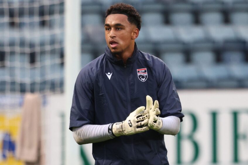 Ross County goalkeeper Jordan Amissah warming up ahead of making his debut against Dundee on December 26, 2024. The SPFL Premiership match ended in a 3-0 win for County. 