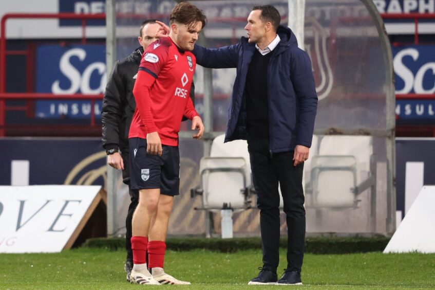 Ross County manager Don Cowie (right) passes on instructions to midfielder Noah Chilvers during Thursday's 3-0 victory for the Dingwall team at Dens Park, Dundee