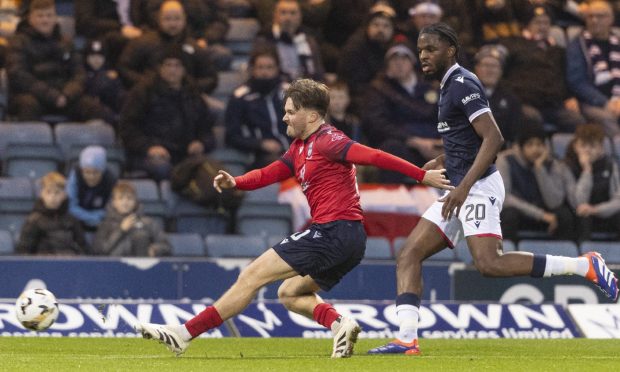 Ross County's Noah Chilvers opens the scoring in the 3-0 win at Dundee with a fine low strike at Dens Park.