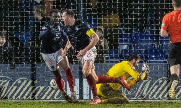 Ross County striker Jordan White turns away after scoring his 98th-minute equaliser in the 2-2 draw against Hearts in the SPFL Premiership on Sunday, December 29 at the Global Energy Stadium, Dingwall.